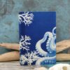 Détail du motif poulpe sur carnet de format poche verso